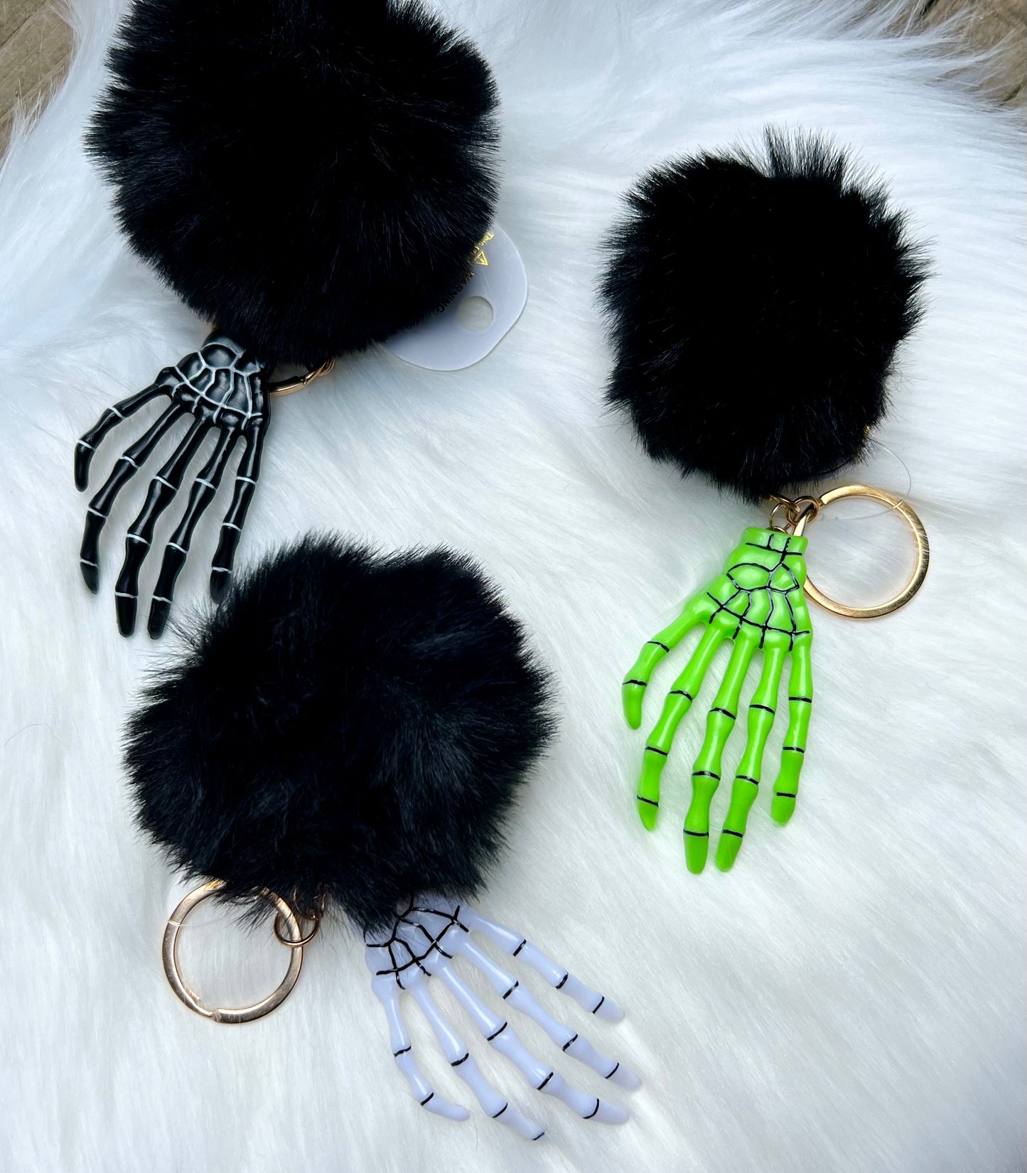 Skeleton Hand Pom Keychain