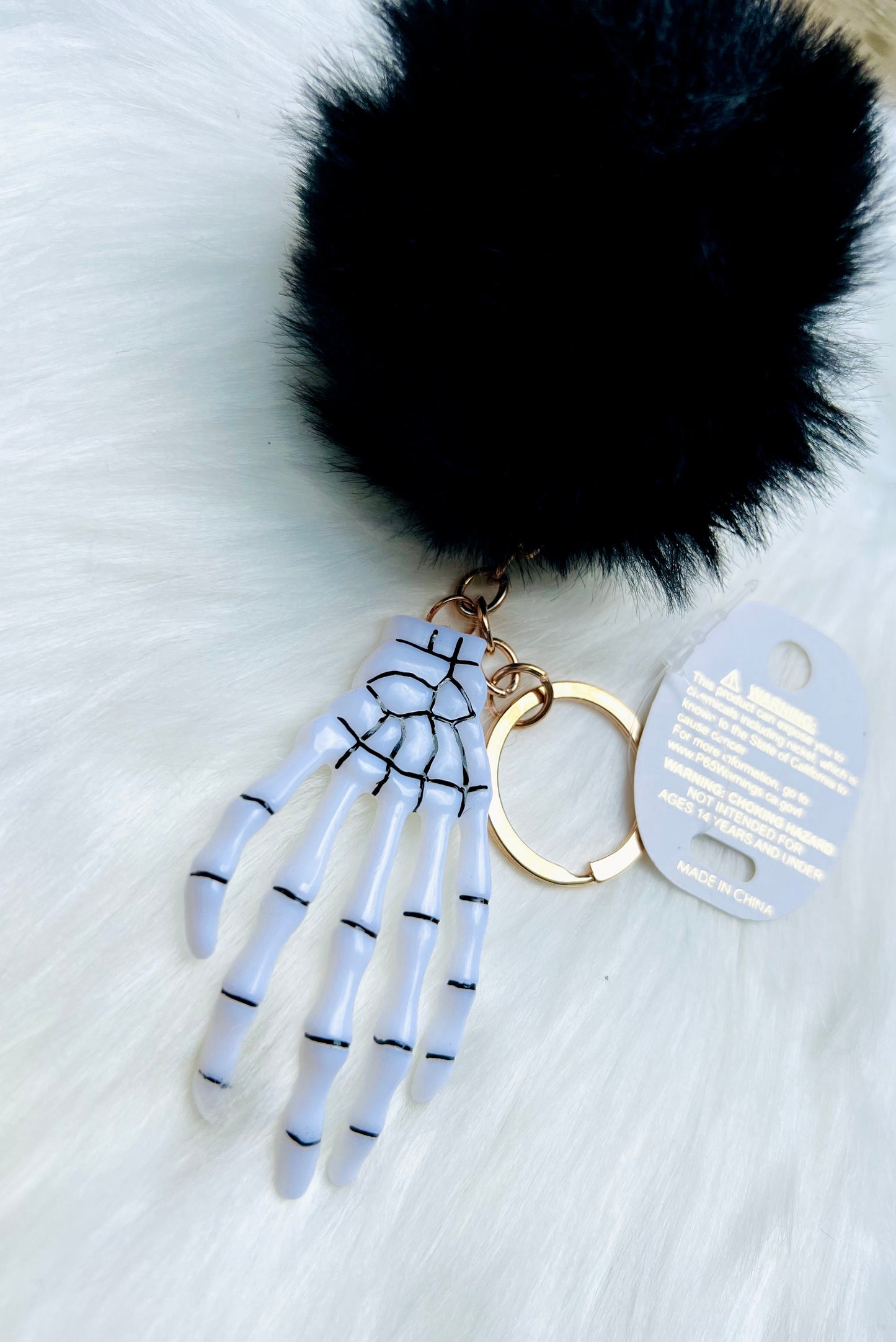 Skeleton Hand Pom Keychain